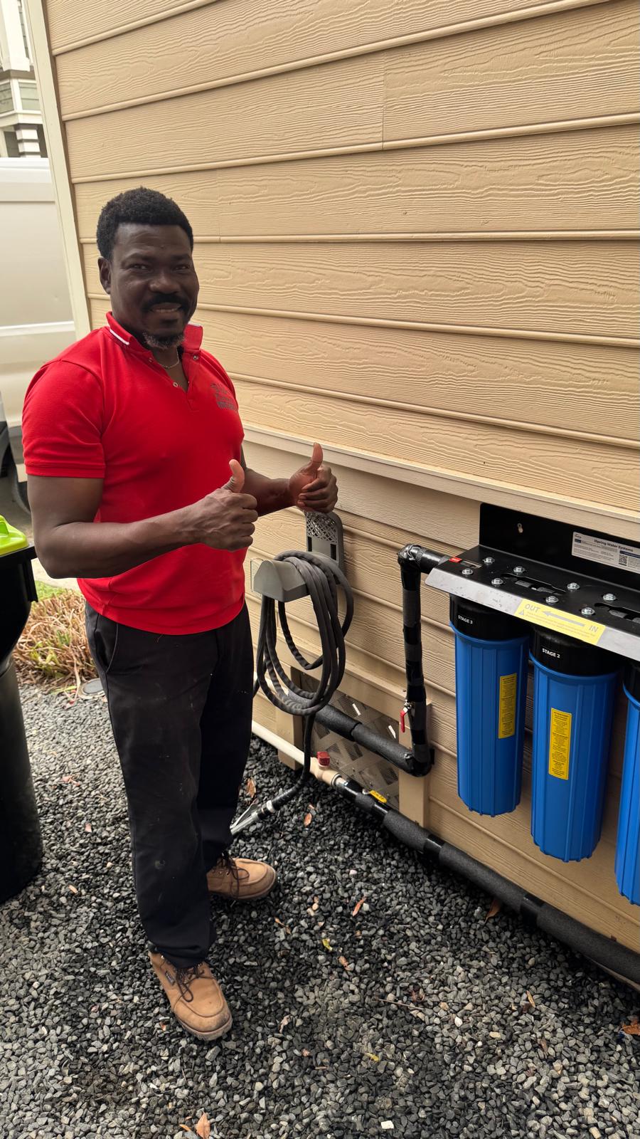 B&P Plumbing technician with completed installation